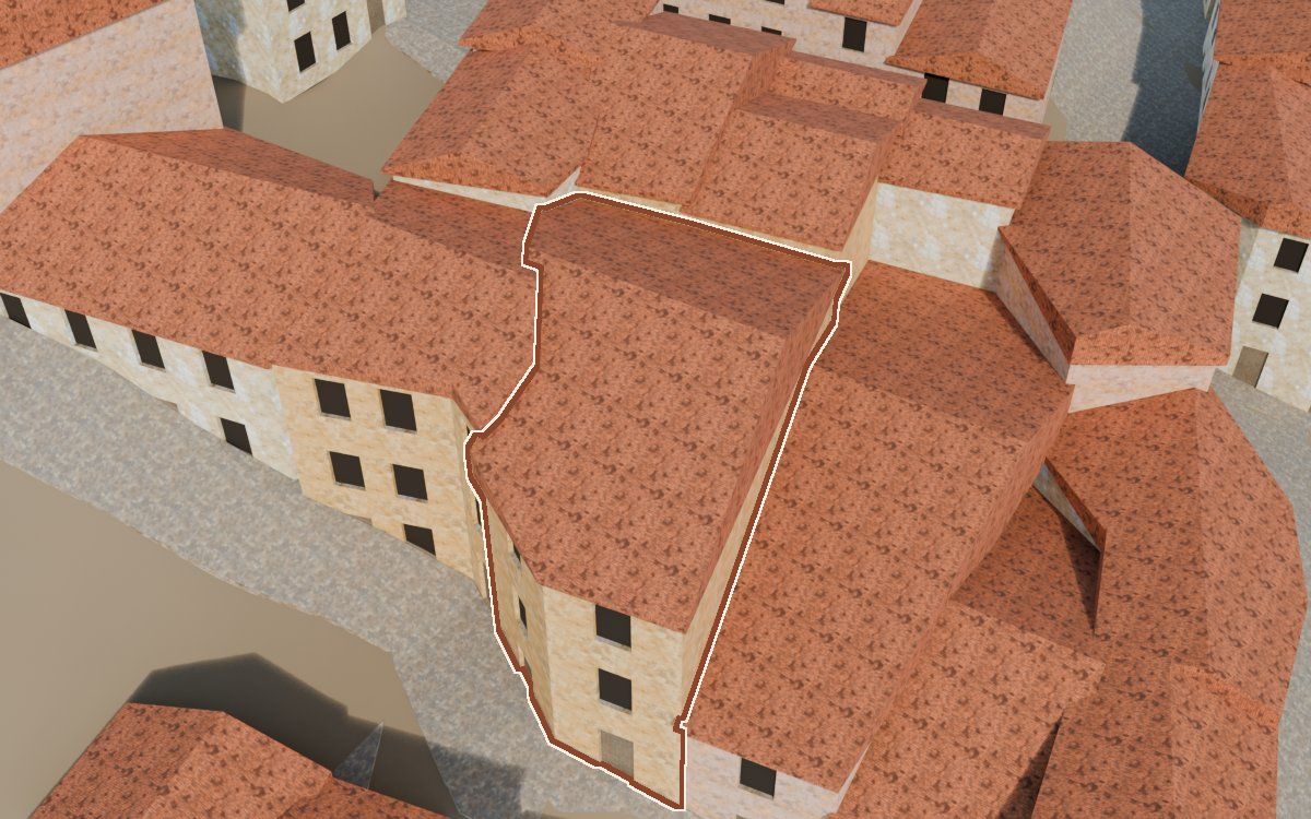 Manzana 41, n.º 15 y 16 a la reconstrucció 3D, vista des del costat on millor es veu, amb el contorn marcat de color teula entre les cases del voltant