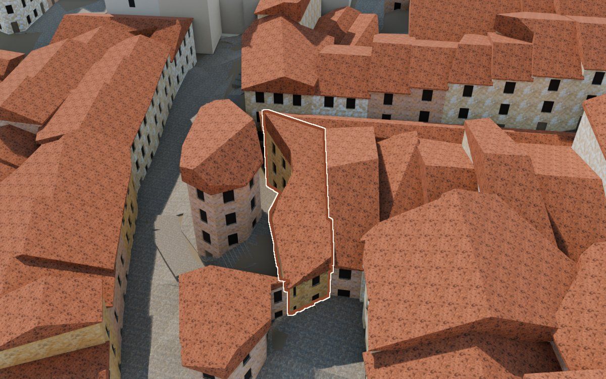 Manzana 33, n.º 18 y 1 a la reconstrucció 3D, vista des del costat on millor es veu, amb el contorn marcat de color teula entre les cases del voltant
