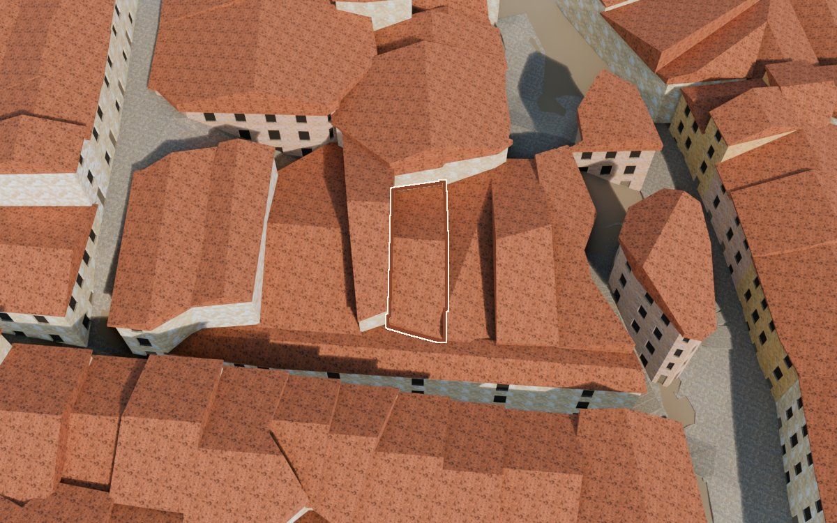 Casa del Carrer Fraga de Dalt a la reconstrucció 3D, vista des del costat on millor es veu, amb el contorn marcat de color teula entre les cases del voltant