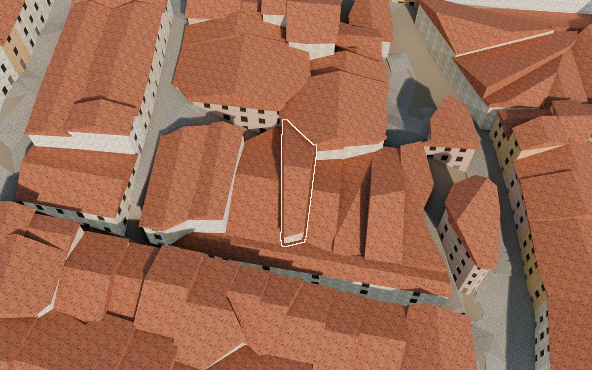 Casa del Carrer de l'Amargura a la reconstrucció 3D, vista des del costat on millor es veu, amb el contorn marcat de color teula entre les cases del voltant